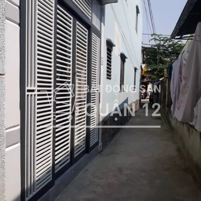 Nhà 1trệt 1lầu 2pn (3.5m x 12m) gần bến xe buýt Hiệp Thành Q-12