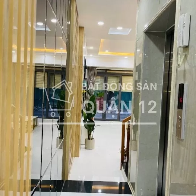 Hẻm xe hơi cách Hà Huy Giáp 100m nhà 5 tầng có thang máy sổ hồng riêng