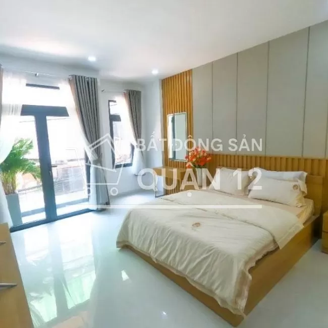 Hẻm xe hơi cách Hà Huy Giáp 100m nhà 5 tầng có thang máy sổ hồng riêng