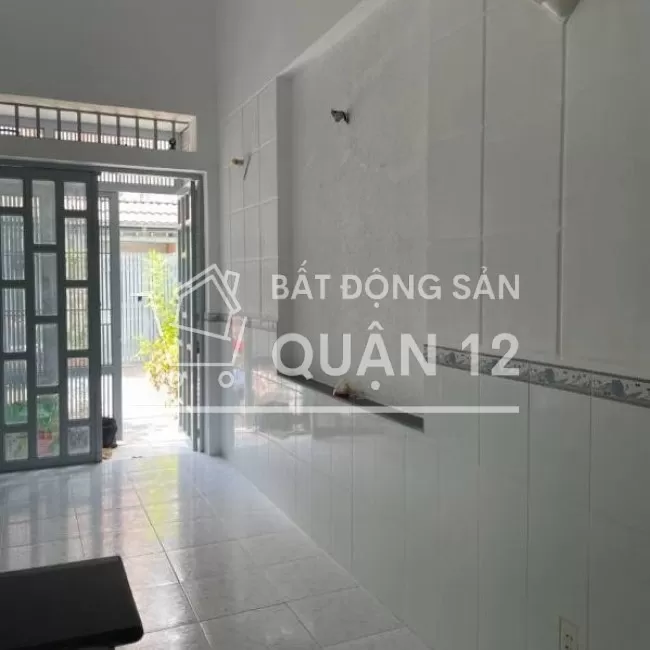 Nhà hẻm xe tải một trục cách đường Nguyễn Văn Quá 60 mét