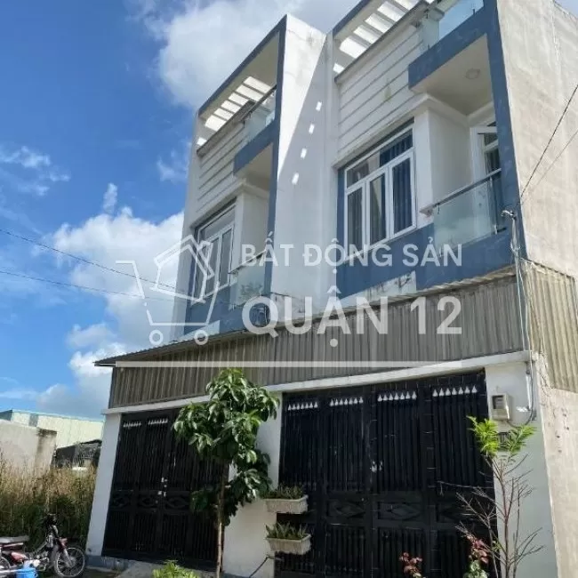 Bán NHÀ 1 trệt 1 lầu ngay chợ Đường, TX52 vào 50m