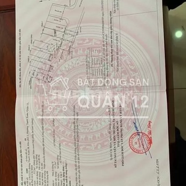 Nhà 1 trệt 3 lầu, có thang máy. 4mx14m. Đường nhựa 8m, vỉa hè 2m.