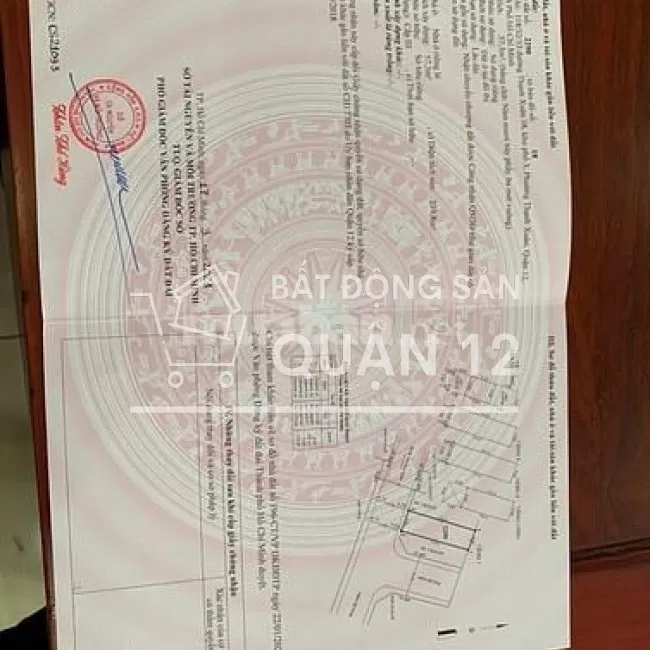Nhà 1 trệt 3 lầu, có thang máy. 4mx14m. Đường nhựa 8m, vỉa hè 2m.