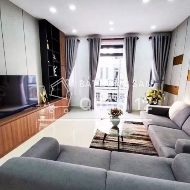 cần tiền bán gấp nhà đường Hà Huy Giáp 3 lầu có sân đậu ôtô gía 4,8 tỷ