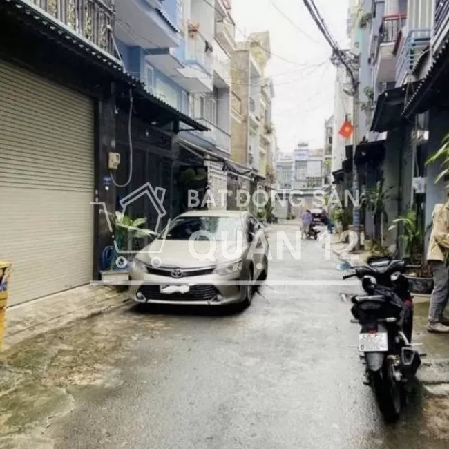 Nhà sổ hồng riêng - đầu hẻm thông - quận 12
