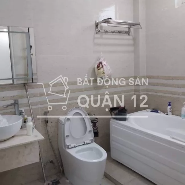 Bán nhà MT Nguyễn Ảnh Thủ, Q12, TPHCM, 155m2, 7 tầng + 8PN + thang máy
