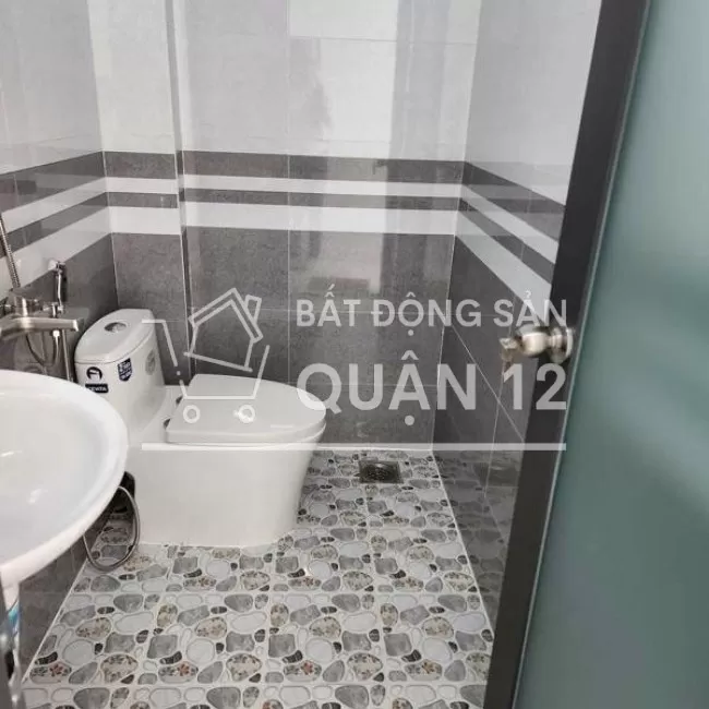 Bán nhà như hình: 3,2x14. 1 lầu. 3PN, 2WC. Hẻm 4m Đường TTH21, Quận 12
