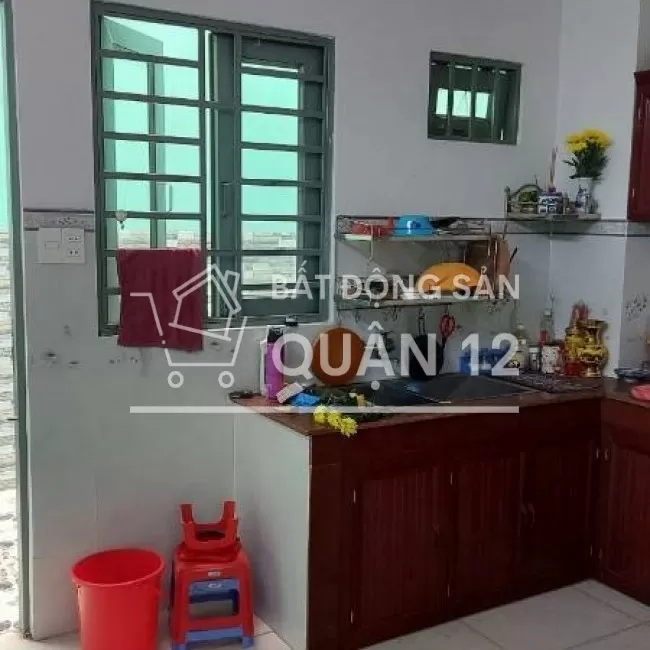 cần bán nhà gấp quận 12 đường 2 xe công tránh