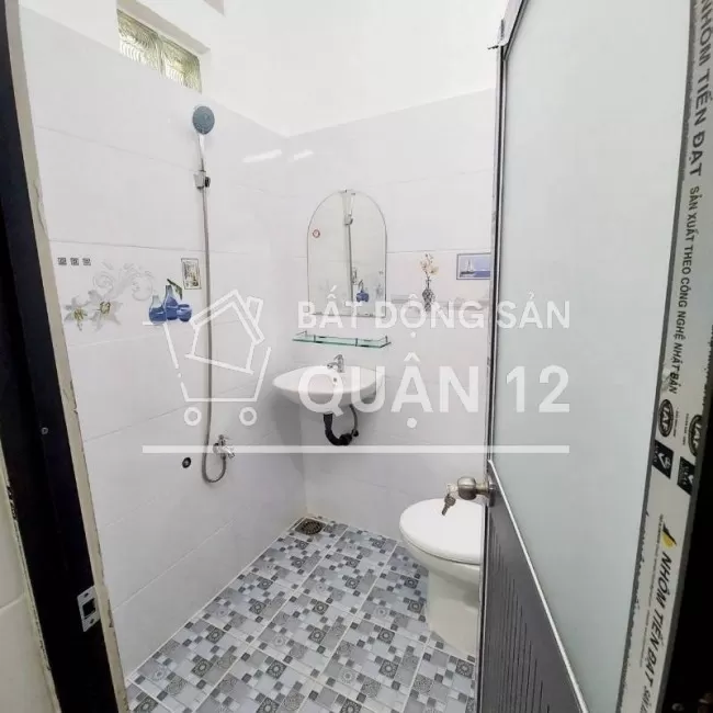 NHÀ 1 XẸC QUỐC LỘ 1A - KHU PHỐ 1 - PHƯỜNG THẠNH XUÂN - QUẬN 12