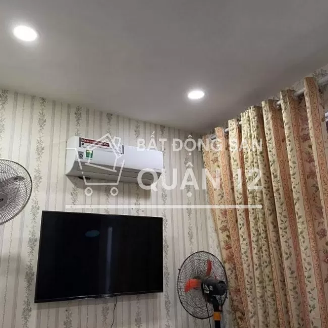 Bán nhà sổ chung 25m2, 2 lầu hẻm QL1A, Quận 12