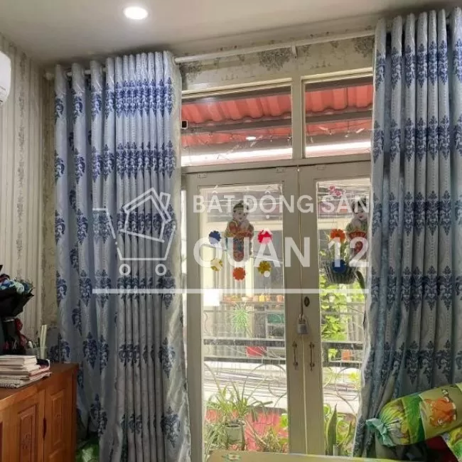 Bán nhà sổ chung 25m2, 2 lầu hẻm QL1A, Quận 12