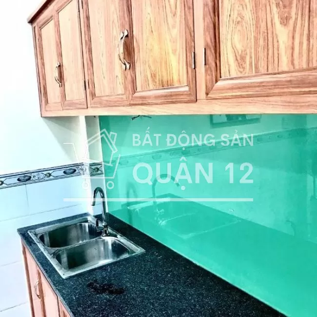 Bán nhà mặt tiền giá rẻ quận 12