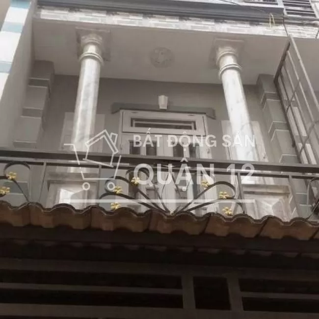 Nhà 2 lầu đường 8m xe hơi quay đầu bày được tiệc cưới trước sân nha